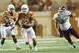 AUSTIN, TX - AUGUST 31: David Ash #14 of the Texas Longhorns breaks free from the New Mexico State Aggies on August 31, 2013 at Darrell K Royal-Texas Memorial Stadium in Austin, Texas. (Photo by Cooper Neill/Getty Images)