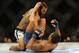 Aug 31, 2013; Milwaukee, WI, USA; Benson Henderson (left) fights Anthony Pettis during the UFC-164 bout at BMO Harris Bradley Center. at BMO Harris Bradley Center. Mandatory Credit: Benny Sieu-USA TODAY Sports