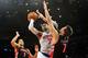 Feb 13, 2013; New York, NY, USA; New York Knicks small forward Carmelo Anthony (7) attempts a shot over Toronto Raptors center Andrea Bargnani (7) during the second half at Madison Square Garden. The Raptors won the game 92-88. Mandatory Credit: Joe Camporeale-USA TODAY Sports