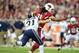 Nov. 25, 2012; Glendale, AZ, USA: St. Louis Rams cornerback Cortland Finnegan (31) tackles Arizona Cardinals wide receiver Larry Fitzgerald (11) at University of Phoenix Stadium. Mandatory Credit: Mark J. Rebilas-USA TODAY Sports