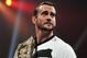 CM Punk, back when he was WWE champion (photo from WWE.com)