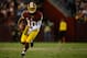LANDOVER, MD - JANUARY 06: Robert Griffin III #10 of the Washington Redskins runs the ball against the Seattle Seahawks during the NFC Wild Card Playoff Game at FedExField on January 6, 2013 in Landover, Maryland. (Photo by Patrick McDermott/Getty Images)