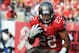 TAMPA, FL - NOVEMBER 11: Running back Doug Martin #22 of the Tampa Bay Buccaneers rushes upfield in the fourth quarter against the San Diego Chargers November 11, 2012 at Raymond James Stadium in Tampa, Florida. Tampa won 34 - 24. (Photo by Al Messerschmidt/Getty Images)