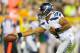 Aug 23, 2013; Green Bay, WI, USA; Seattle Seahawks quarterback Russell Wilson (3) during the game against the Green Bay Packers at Lambeau Field. Seattle won 17-10. Mandatory Credit: Jeff Hanisch-USA TODAY Sports