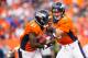 DENVER, CO - AUGUST 24: Quarterback Peyton Manning #18 of the Denver Broncos hands the ball off to running back Ronnie Hillman #21 against the St. Louis Rams at Sports Authority Field at Mile High on August 24, 2013 in Denver, Colorado. (Photo by Justin Edmonds/Getty Images)
