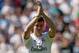 MADRID, SPAIN - SEPTEMBER 02: Gareth Bale waves to fans in his new Real Madrid shirt during his official unveiling at estadio Santiago Bernabeu on September 2, 2013 in Madrid, Spain. (Photo by Denis Doyle/Getty Images)