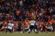 DENVER, CO - JANUARY 12: Offensive linemen Orlando Franklin #74, Chris Kuper #73, Dan Koppen #67, Zane Beadles #68 and Ryan Clady #78 of the Denver Broncos get set to block as quarterback Peyton Manning #18 calls out signals at the line of scrimmage against Ray Lewis #52 of the Baltimore Ravens during the AFC Divisional Playoff Game at Sports Authority Field at Mile High on January 12, 2013 in Denver, Colorado. (Photo by Doug Pensinger/Getty Images)