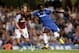 LONDON, ENGLAND - AUGUST 21: Romelu Lukaku of Chelsea holds off the challenge from Ron Vlaar of Aston Villa during the Barclays Premier League match between Chelsea and Aston Villa at Stamford Bridge on August 21, 2013 in London, England. (Photo by Scott Heavey/Getty Images)
