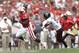 MILWAUKEE, WI - AUGUST 31: Corey Clement #6 of the Wisconsin Badgers avoids the tackle from Trey Dudley-Giles #9 of the UMass Minutemen and runs in for a touchdown during the game at Camp Randall Stadium on August 31, 2013 in Madison, Wisconsin. (Photo by Mike McGinnis/Getty Images)