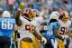 Aug 8, 2013; Nashville, TN, USA; Washington Redskins outside linebacker Brian Orakpo (98) celebrates sacking Tennessee Titans quarterback Jake Locker (10) during the first half against the Washington Redskins at LP Field. Mandatory Credit: Jim Brown-USA TODAY Sports