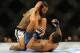 Aug 31, 2013; Milwaukee, WI, USA; Benson Henderson (left) fights Anthony Pettis during the UFC-164 bout at BMO Harris Bradley Center. at BMO Harris Bradley Center. Mandatory Credit: Benny Sieu-USA TODAY Sports