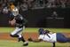 Aug 23, 2013; Oakland, CA, USA; Oakland Raiders quarterback Terrelle Pryor (2) avoids a tackle by Chicago Bears defensive end Aston Whiteside (71) during the third quarter at O.Co Coliseum. The Chicago Bears defeated the Oakland Raiders 34-26. Mandatory Credit: Ed Szczepanski-USA TODAY Sports