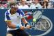 Sep 2, 2013; New York, NY, USA; David Ferrer (ESP) returns a shot against Janko Tipsarevic (SRB) on day eight of the 2013 US Open at USTA Billie Jean King National Tennis Center. Mandatory Credit: Jerry Lai-USA TODAY Sports