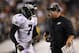 Aug 15, 2013; Philadelphia, PA, USA; Philadelphia Eagles head coach Chip Kelly talks with quarterback Michael Vick (7) during the second quarter against the Carolina Panthers at Lincoln Financial Field. Mandatory Credit: Howard Smith-USA TODAY Sports
