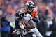 DENVER, CO - JANUARY 12: Champ Bailey #24 of the Denver Broncos breaks up a pass intended for Torrey Smith #82 of the Baltimore Ravens during the AFC Divisional Playoff Game at Sports Authority Field at Mile High on January 12, 2013 in Denver, Colorado. (Photo by Jeff Gross/Getty Images)