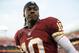Aug 19, 2013; Landover, MD, USA; A Washington Redskins quarterback Robert Griffin III (10) walks off the field after warm ups prior to the Redskins game against the Pittsburgh Steelers at FedEx Field. The Redskins won 24-13. Mandatory Credit: Geoff Burke-USA TODAY Sports