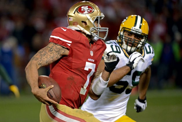 Harbaugh: Hits on Running QBs Are 'Gray Area'