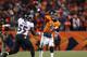 DENVER, CO - JANUARY 12: Peyton Manning #18 of the Denver Broncos throws a pass in in the fourth quarter against Terrell Suggs #55 of the Baltimore Ravens during the AFC Divisional Playoff Game at Sports Authority Field at Mile High on January 12, 2013 in Denver, Colorado. (Photo by Jeff Gross/Getty Images)