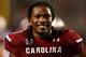 COLUMBIA, SC - AUGUST 29: Jadeveon Clowney #7 of the South Carolina Gamecocks smiles on the sidelines on the way to defeating the North Carolina Tar Heels 27-10 at Williams-Brice Stadium on August 29, 2013 in Columbia, South Carolina. (Photo by Streeter Lecka/Getty Images)