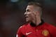 BANGKOK, THAILAND - JULY 13: Alex Buttner #28 of Manchester United argues a call during the friendly match between Singha All Star XI and Manchester United at Rajamangala Stadium on July 13, 2013 in Bangkok, Thailand. (Photo by Chris McGrath/Getty Images)