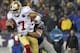 Dec 16, 2012; Foxboro, Massachusetts, USA; San Francisco 49ers quarterback Colin Kaepernick (7) gets sacked by New England Patriots defensive end Rob Ninkovich (50) during the fourth quarter at Gillette Stadium. The San Francisco 49ers won 41-34. Mandatory Credit: Greg M. Cooper-USA TODAY Sports