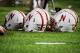 LINCOLN, NE - AUGUST 31: Nebraska Cornhuskers helmets are lined up during their game against the Wyoming Cowboys at Memorial Stadium on August 31, 2013 in Lincoln, Nebraska. Nebraska defeated Wyoming 37-34. (Photo by Eric Francis/Getty Images)