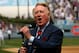 LOS ANGELES - APRIL 13: Dodgers broadcaster Vin Scully gives the call of 'It's time for Dodger baseball!' during pregame ceremonies for the Los Angeles Dodgers home opener against the San Francisco Giants on April 13, 2009 at Dodger Stadiium in Los Angeles, California. (Photo by Stephen Dunn/Getty Images)