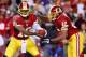 Jan 6, 2013; Landover, MD, USA; Washington Redskins quarterback Robert Griffin III (10) hands the ball off to Redskins running back Alfred Morris (46) against the Seattle Seahawks during the NFC Wild Card playoff game at FedEx Field. Mandatory Credit: Geoff Burke-USA TODAY Sports