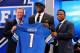NEW YORK, NY - APRIL 25: Ezekiel Ansah of the BYU Cougars stands with NFL Commissioner Roger Goodell (L) and Pro Football Hall of Famer Barry Sanders (R) as they hold up a jersey on stage after Ansah was picked #5 overall by the Detroit Lions in the first round of the 2013 NFL Draft at Radio City Music Hall on April 25, 2013 in New York City. (Photo by Al Bello/Getty Images)