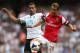 LONDON, ENGLAND - SEPTEMBER 01: Nacer Chadli of Spurs and Mathieu Flamini of Arsenal battle for the ball during the Barclays Premier League match between Arsenal and Tottenham Hotspur at Emirates Stadium on September 01, 2013 in London, England. (Photo by Clive Mason/Getty Images)