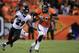 DENVER, CO - SEPTEMBER 5: Julius Thomas #80 of the Denver Broncos runs by Michael Huff #29 of the Baltimore Ravens before running in for a 24-yard touchdown in the second quarter during the game at Sports Authority Field at Mile High on September 5, 2013 in Denver Colorado. (Photo by Doug Pensinger/Getty Images)