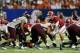 ATLANTA, GA - AUGUST 31: AJ McCarron #10 of the Alabama Crimson Tide runs the offense against the Virginia Tech Hokies defense at Georgia Dome on August 31, 2013 in Atlanta, Georgia. (Photo by Kevin C. Cox/Getty Images)