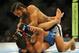 Aug 31, 2013; Milwaukee, WI, USA; Benson Henderson (top) fights Anthony Pettis during the UFC-164 bout at BMO Harris Bradley Center. at BMO Harris Bradley Center. Mandatory Credit: Benny Sieu-USA TODAY Sports
