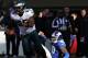 EAST RUTHERFORD, NJ - DECEMBER 30: LeSean McCoy #25 of the Philadelphia Eagles carries the ball as Jason Pierre-Paul #90 of the New York Giants is on the ground at MetLife Stadium on December 30, 2012 in East Rutherford, New Jersey. (Photo by Elsa/Getty Images)