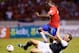 SAN JOSE, COSTA RICA - SEPTEMBER 06: Omar Gonzalez #3 of the United States makes a slide tackle against Joel Campbell #12 during the FIFA 2014 World Cup Qualifier at Estadio Nacional on September 6, 2013 in San Jose, Costa Rica. (Photo by Kevin C. Cox/Getty Images)