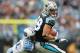 CHARLOTTE, NC - NOVEMBER 13: Greg Olsen #88 of the Carolina Panthers is tackled by Gerald McRath #51 of the Tennessee Titans during their game at Bank of America Stadium on November 13, 2011 in Charlotte, North Carolina. (Photo by Streeter Lecka/Getty Images)