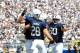 Sep 7, 2013; University Park, PA, USA; Penn State Nittany Lions running back Zach Zwinak (28) celebrates with teammates Jesse James (18) and Ty Howle (60) after scoring a touchdown during the third quarter against the Eastern Michigan Eagles at Beaver Stadium. Penn State defeated Eastern Michigan 45-7. Mandatory Credit: Matthew O'Haren-USA TODAY Sports