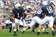 Sep 7, 2013; University Park, PA, USA; Penn State Nittany Lions running back Bill Belton (1) runs the ball during the fourth quarter against the Eastern Michigan Eagles at Beaver Stadium. Penn State defeated Eastern Michigan 45-7. Mandatory Credit: Matthew O'Haren-USA TODAY Sports