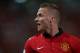 BANGKOK, THAILAND - JULY 13: Alex Buttner #28 of Manchester United argues a call during the friendly match between Singha All Star XI and Manchester United at Rajamangala Stadium on July 13, 2013 in Bangkok, Thailand. (Photo by Chris McGrath/Getty Images)