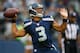 SEATTLE, WA - AUGUST 29: Quarterback Russell Wilson #3 of the Seattle Seahawks passes against the Oakland Raiders at CenturyLink Field on August 29, 2013 in Seattle, Washington. (Photo by Otto Greule Jr/Getty Images)