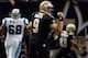 NEW ORLEANS, LA - DECEMBER 30: Drew Brees #9 of the New Orleans Saints reacts after throwing a touchdown pass to Darren Sproles #43 of the New Orleans Saints during the game against the Carolina Panthers at the Mercedes-Benz Superdome on December 30, 2012 in New Orleans, Louisiana. (Photo by Chris Graythen/Getty Images)