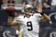 HOUSTON, TX - AUGUST 25: Drew Brees #9 of the New Orleans Saints looks for a receiver against the Houston Texans at Reliant Stadium on August 25, 2013 in Houston, Texas. (Photo by Bob Levey/Getty Images)