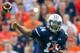AUBURN, AL - AUGUST 31: Quarterback Nick Marshall #14 of the Auburn Tigers throws a pass downfield while playing against the Washington State Cougars on August 31, 2013 at Jordan-Hare Stadium in Auburn, Alabama. At halftime Auburn leads Washington State 25-21. (Photo by Michael Chang/Getty Images)