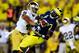 Sep 7, 2013; Ann Arbor, MI, USA; Michigan Wolverines tight end Devin Funchess (87) is unable to make a catch while being defended by Notre Dame Fighting Irish safety Matthias Farley (41) during the fourth quarter at Michigan Stadium. Mandatory Credit: Andrew Weber-USA TODAY Sports