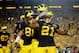 Sep 7, 2013; Ann Arbor, MI, USA; Michigan Wolverines wide receiver Jeremy Gallon (21) celebrates with teammates after scoring a touchdown during the third quarter against the Notre Dame Fighting Irish at Michigan Stadium. Mandatory Credit: Andrew Weber-USA TODAY Sports