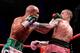 GLASGOW, SCOTLAND - SEPTEMBER 07: Ricky Burns is caught by Raymundo Beltran during their WBO World Lightweight Title bout at SECC on September 7, 2013 in Glasgow, Scotland. (Photo by Scott Heavey/Getty Images)