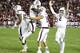 TUSCALOOSA, AL - NOVEMBER 10: Quarterback Johnny Manziel #2 of the Texas A&M Aggies (right) celebrates with other teammates during the game against the Alabama Crimson Tide at Bryant-Denny Stadium on November 10, 2012 in Tuscaloosa, Alabama. (Photo by Mike Zarrilli/Getty Images)