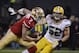 Jan 12, 2013; San Francisco, CA, USA; San Francisco 49ers quarterback Colin Kaepernick (7) runs the ball against Green Bay Packers outside linebacker Clay Matthews (52) during the second quarter of the NFC divisional round playoff game at Candlestick Park. Mandatory Credit: Robert Hanashiro-USA TODAY Sports