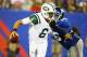 EAST RUTHERFORD, NJ - AUGUST 24: Mark Sanchez #6 of the New York Jets is sacked by Marvin Austin #96 of the New York Giants during their pre season game at MetLife Stadium on August 24, 2013 in East Rutherford, New Jersey. (Photo by Al Bello/Getty Images)