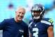 CHARLOTTE, NC - SEPTEMBER 08: Head coach Pete Carroll of the Seattle Seahawks talks with his quarterback Russell Wilson #3 of the Seattle Seahawks before their game against the Carolina Panthers at Bank of America Stadium on September 8, 2013 in Charlotte, North Carolina. (Photo by Streeter Lecka/Getty Images)